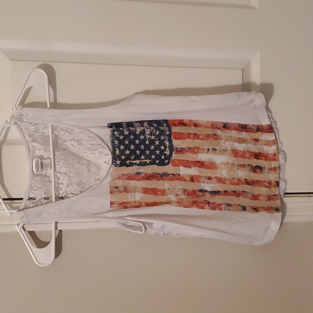 White tank with American flag. Back is see through floral design